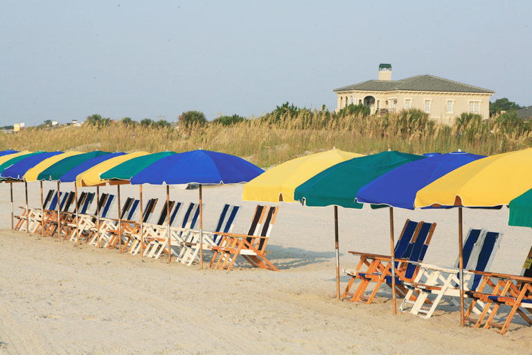 beach chairs and umbrellas on beach