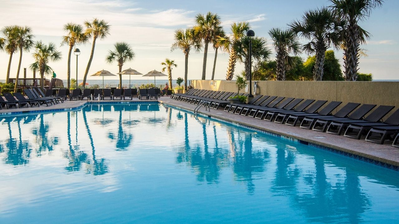 Outdoor pool at sunrise at Ocean Reef