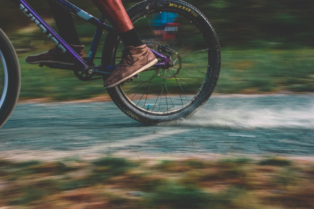 person Riding Bike