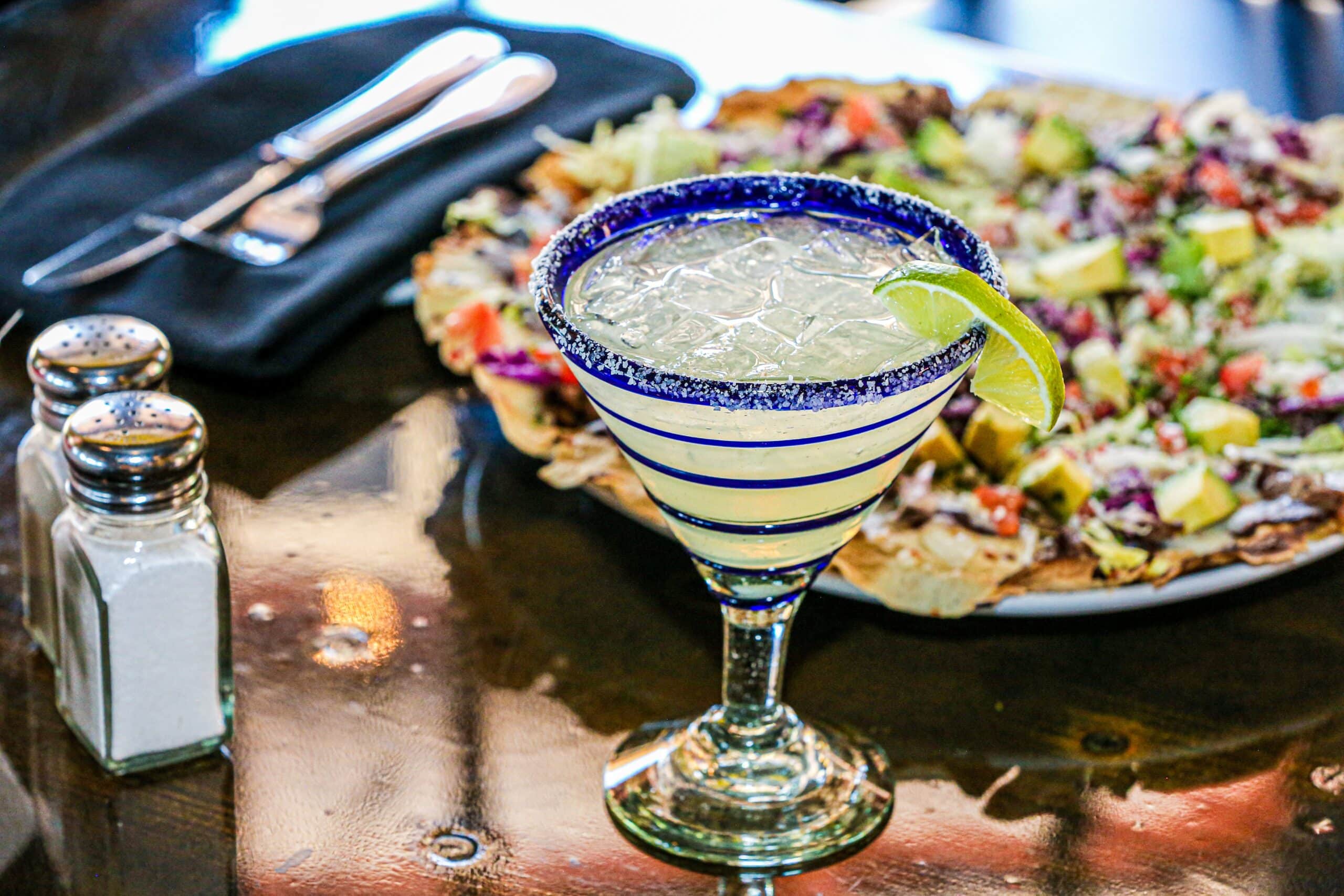 nachos and margarita at mexican restaurant