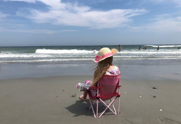 Girl on Beach with Hat